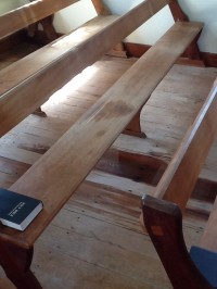 Water Damage to the Pews and Floors