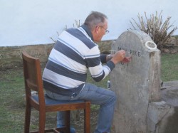 Neill Pike re-lettering his GGG Grandfather's, William Pike, Grave 