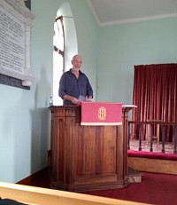 Courteney Bradfield delivering his talk