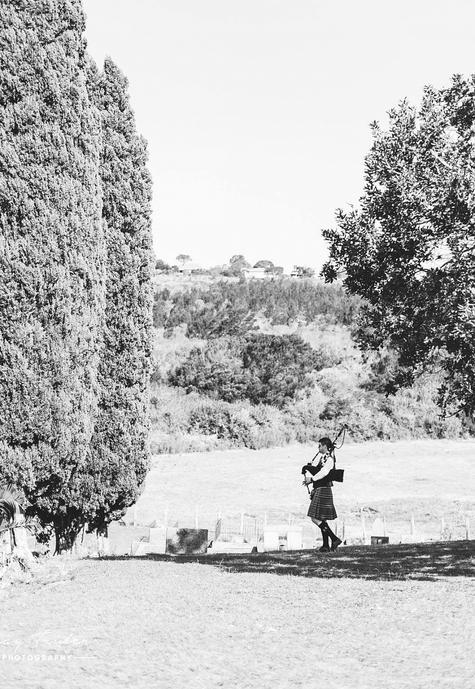 A lone piper amongst the Clumber graves